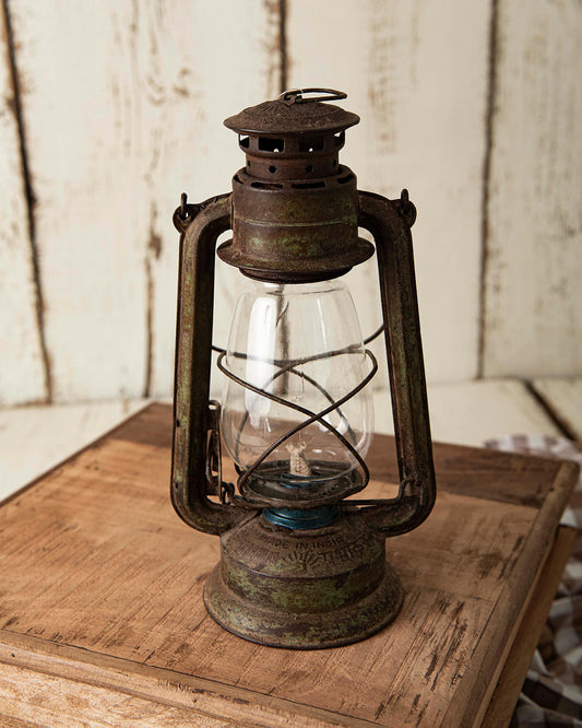 antique rusty oil lamp